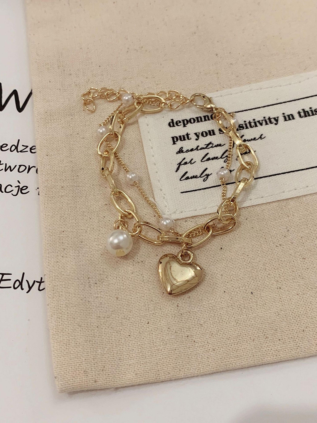 YouBella Jewellery Gold Plated Heart Shape Bracelet for Girls and Women (Gold) (YBBN_91787)
